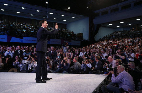 Man presenting to large audience