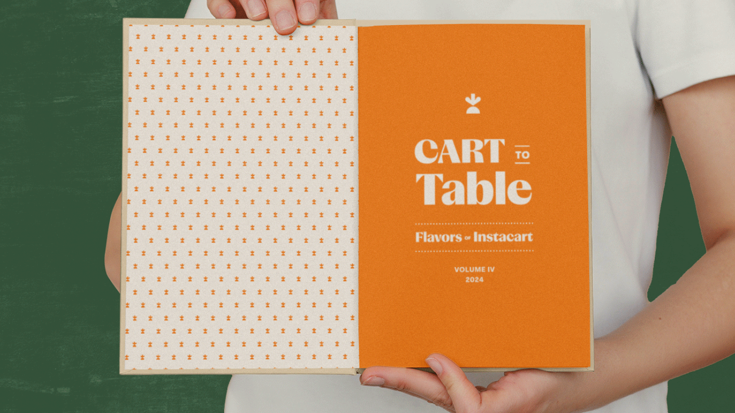 A person holds open an orange and white booklet titled "Cart to Table: Flavors - Instacart, Volume IV, 2024" against a dark green background.