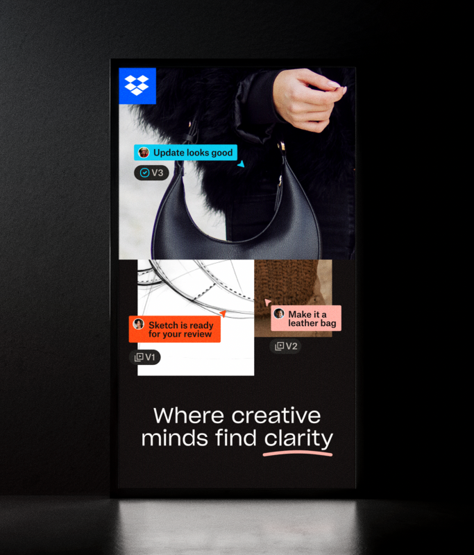 A phone screen displays the Dropbox interface with update notifications about a leather bag design. Text at the bottom reads, “Where creative minds find clarity.”.