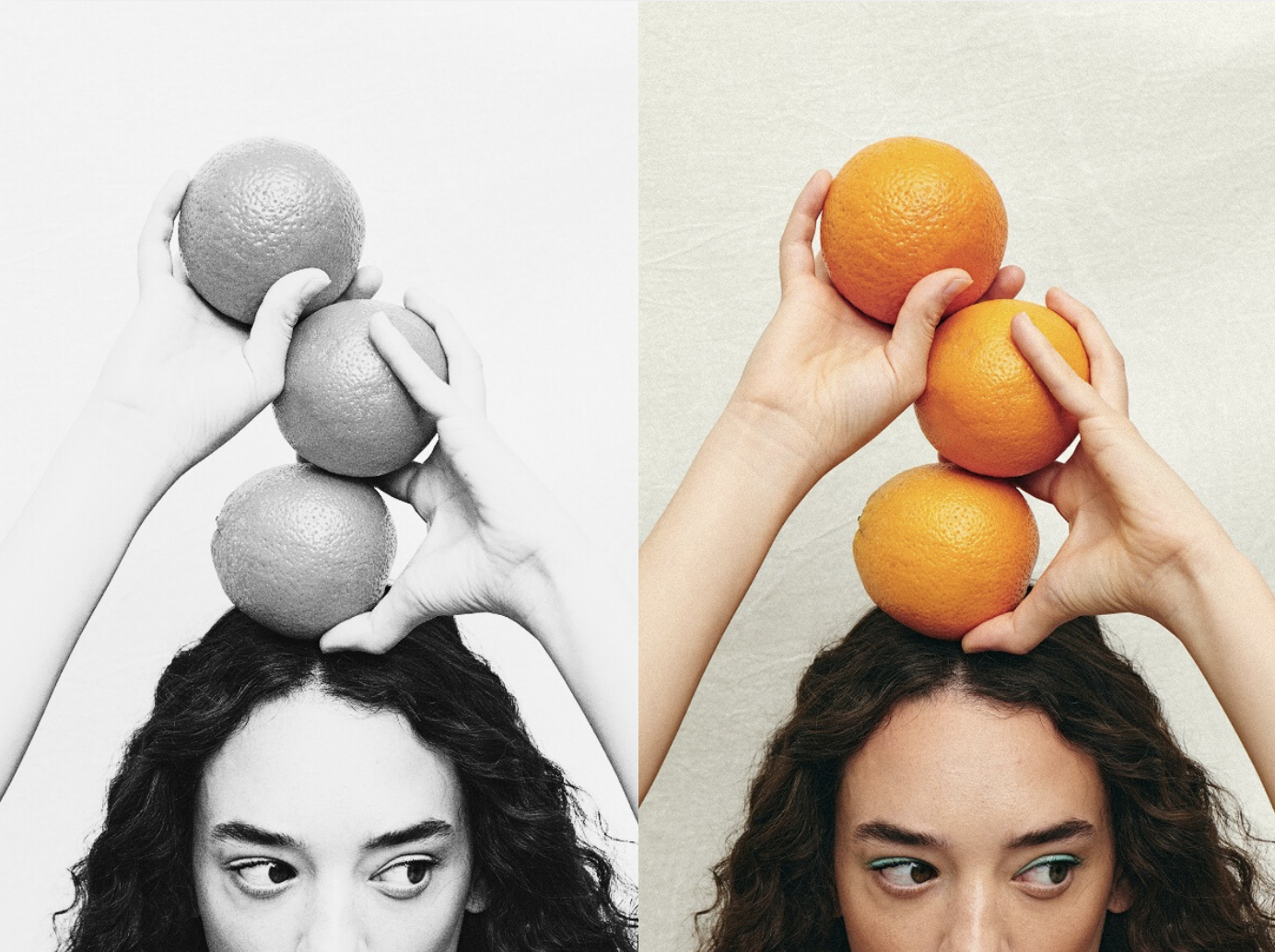 A person holds three oranges stacked on their head. The left half of the image is black and white; the right half is in color.