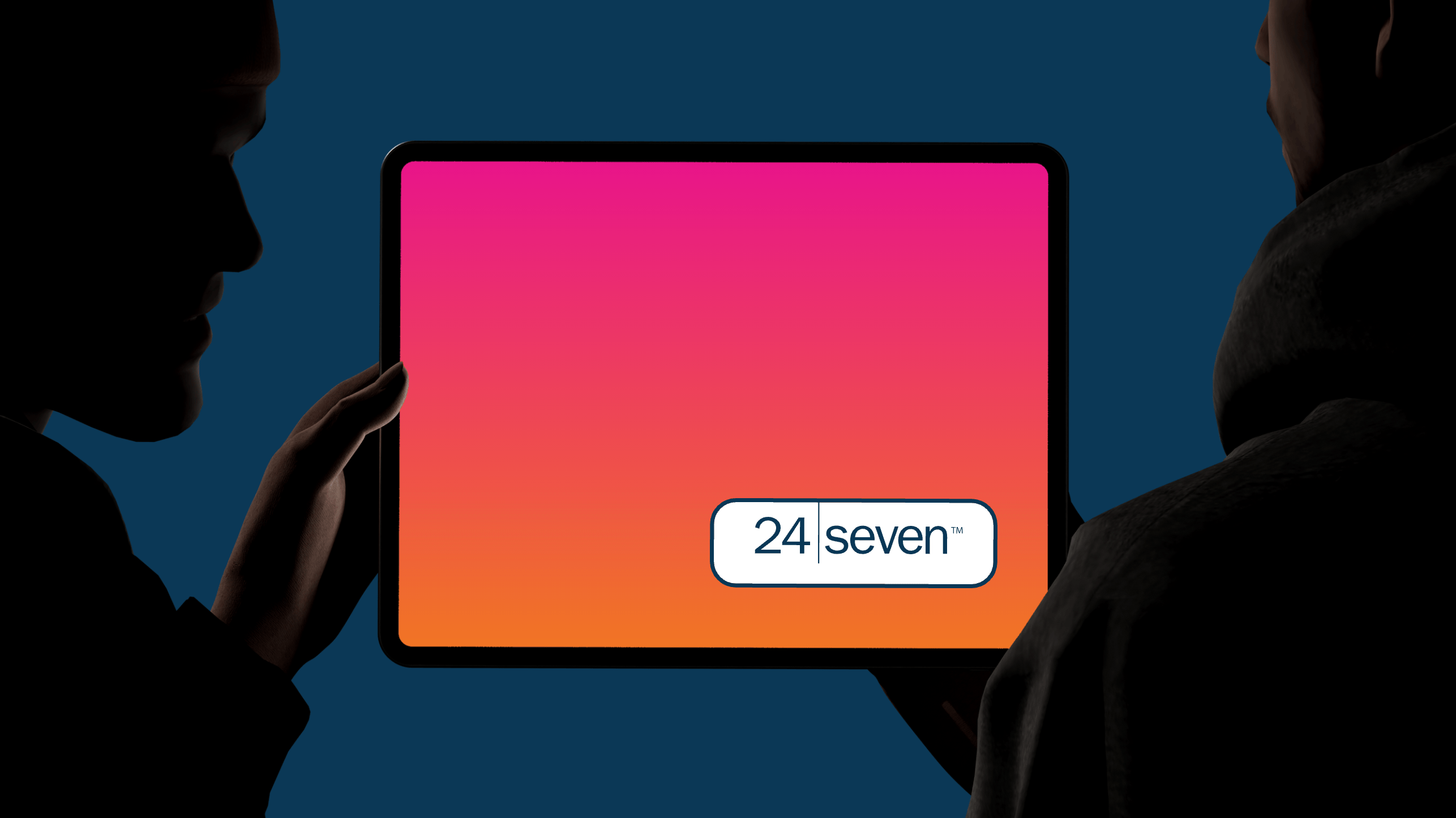 Two silhouetted figures hold a tablet displaying a gradient screen with the text "24 seven*" in a rounded rectangle at the center, symbolizing next-level success.