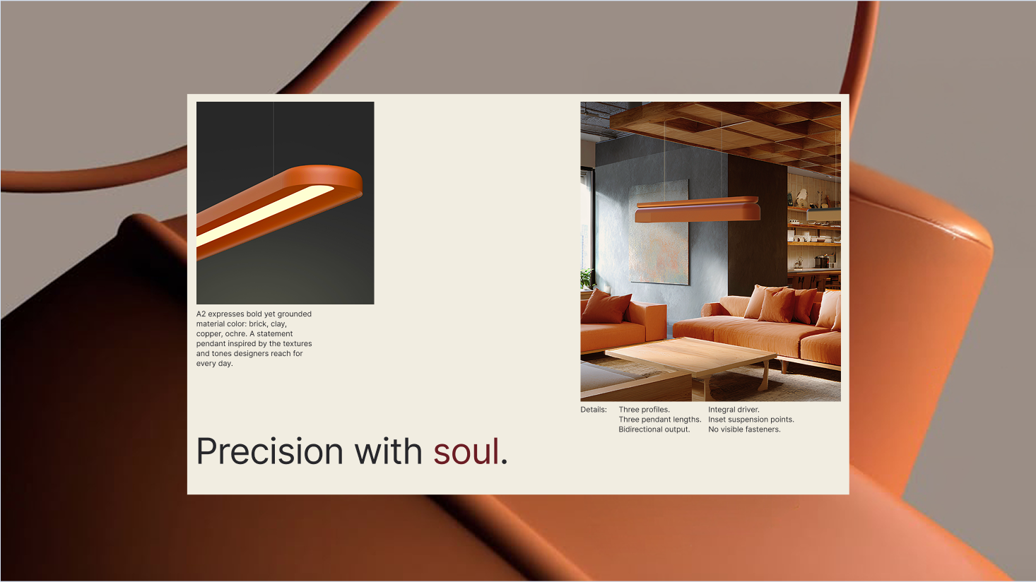 A modern orange ceiling light fixture from Studio by Nulite is shown in close-up above a seating area in a contemporary living room with brown and orange accents, highlighting premium brand identity and innovative product features.