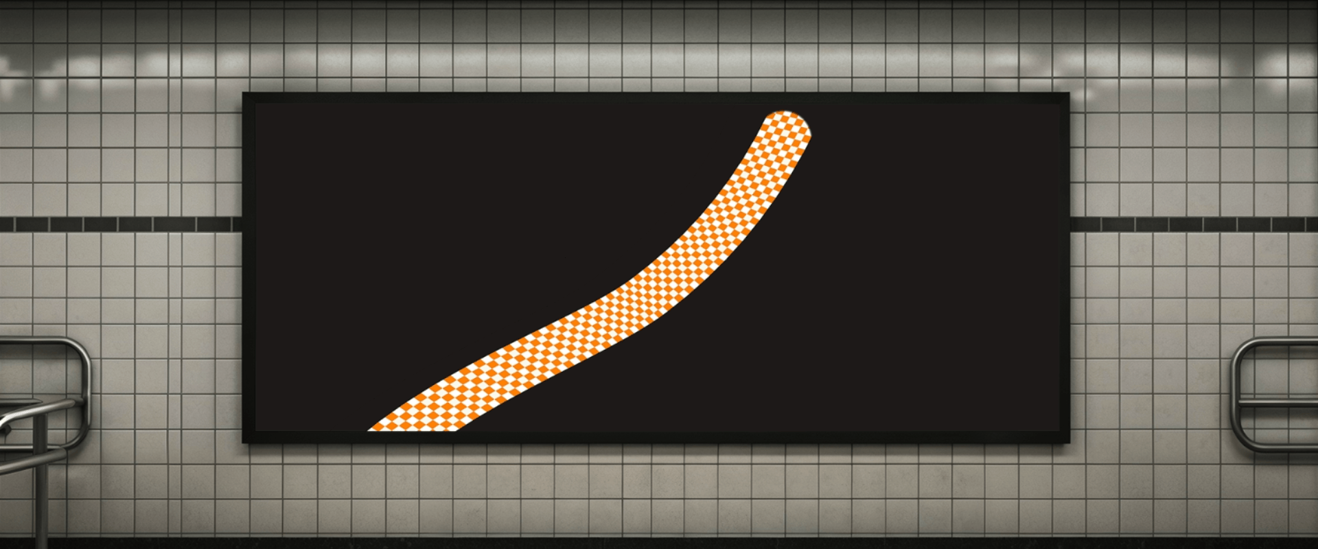 Large black billboard in a tiled subway station displays an upward diagonal orange and white checkered stripe, reminiscent of McLaren’s signature racing livery.