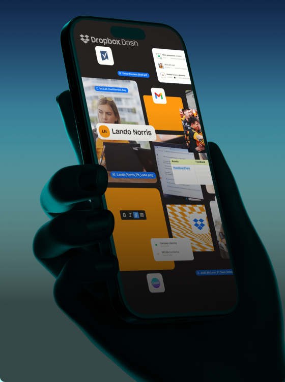 A hand holds a smartphone displaying the Dropbox Dash app, featuring various files, folders, and images on the screen—all powered by advanced AI to streamline your workflow.