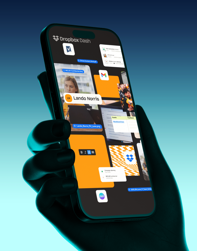 A hand holds a smartphone displaying a Dropbox Dash interface with app icons, documents, and a user contact named Lando Norris—reflecting the seamless integration of AI and McLaren collaboration within the Dropbox Dash experience.